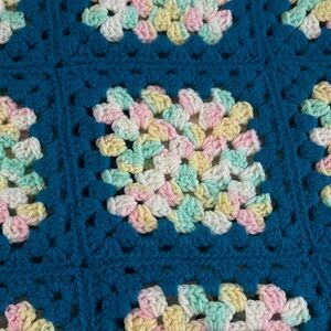 Crochet grandma square lap blanket 
5’6” long x 27” wide Pastel and teal